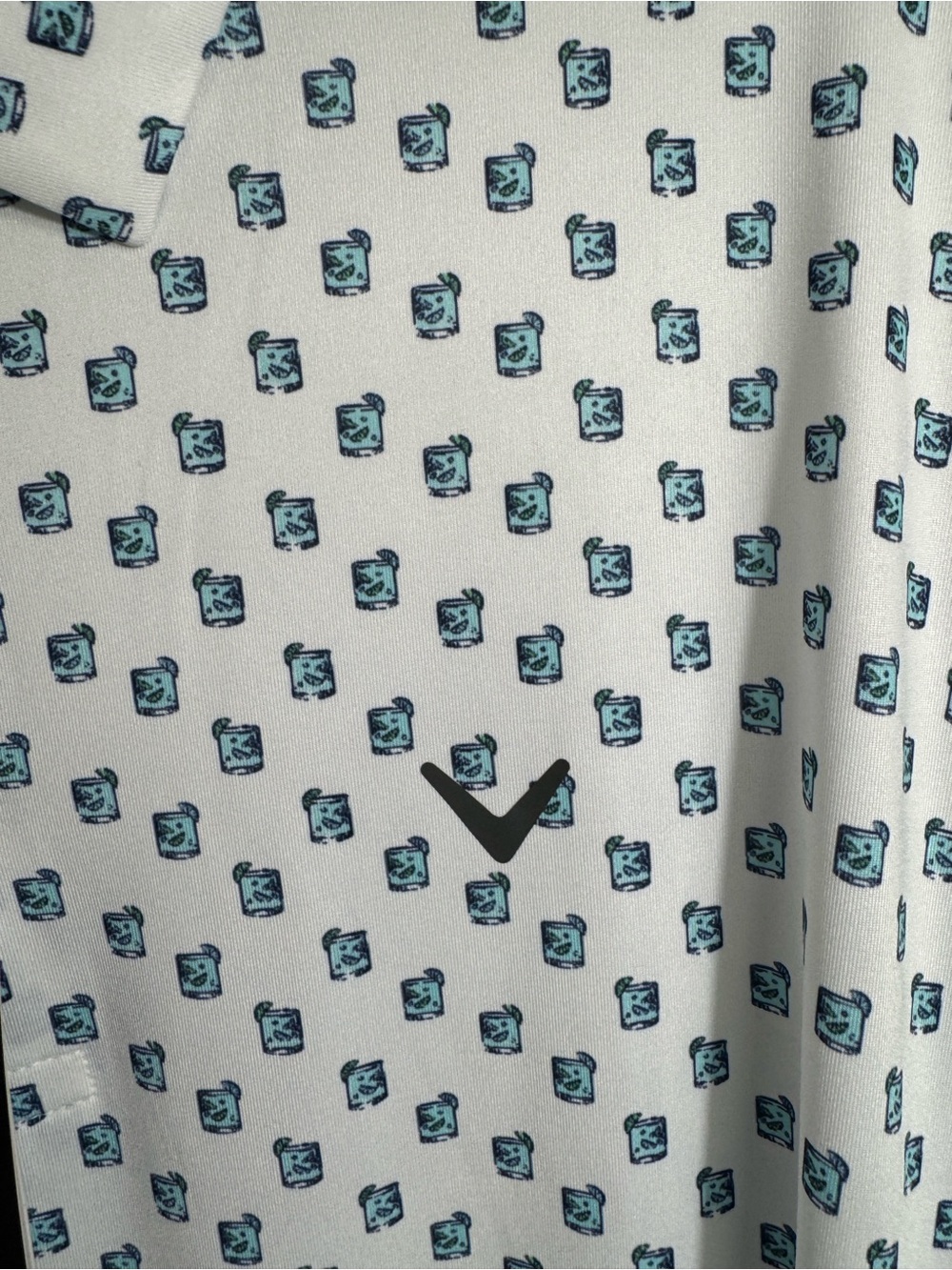 Callaway Opti-Dri Golf Polo Shirt featuring an all-over tropical cocktail print.
